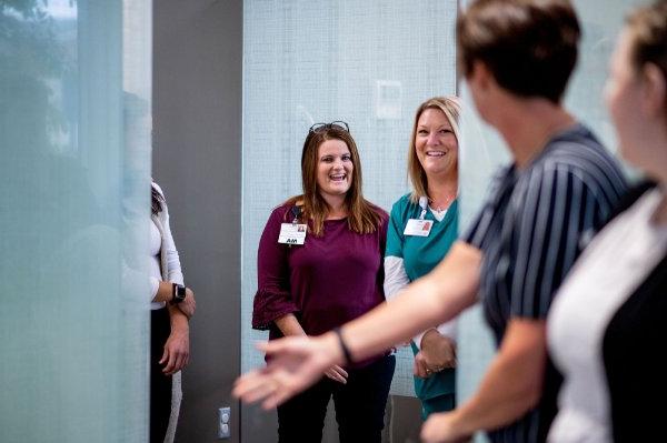 Staff members at the GVSU Campus Health Center are introduced during an open house celebration at the location September 27. 